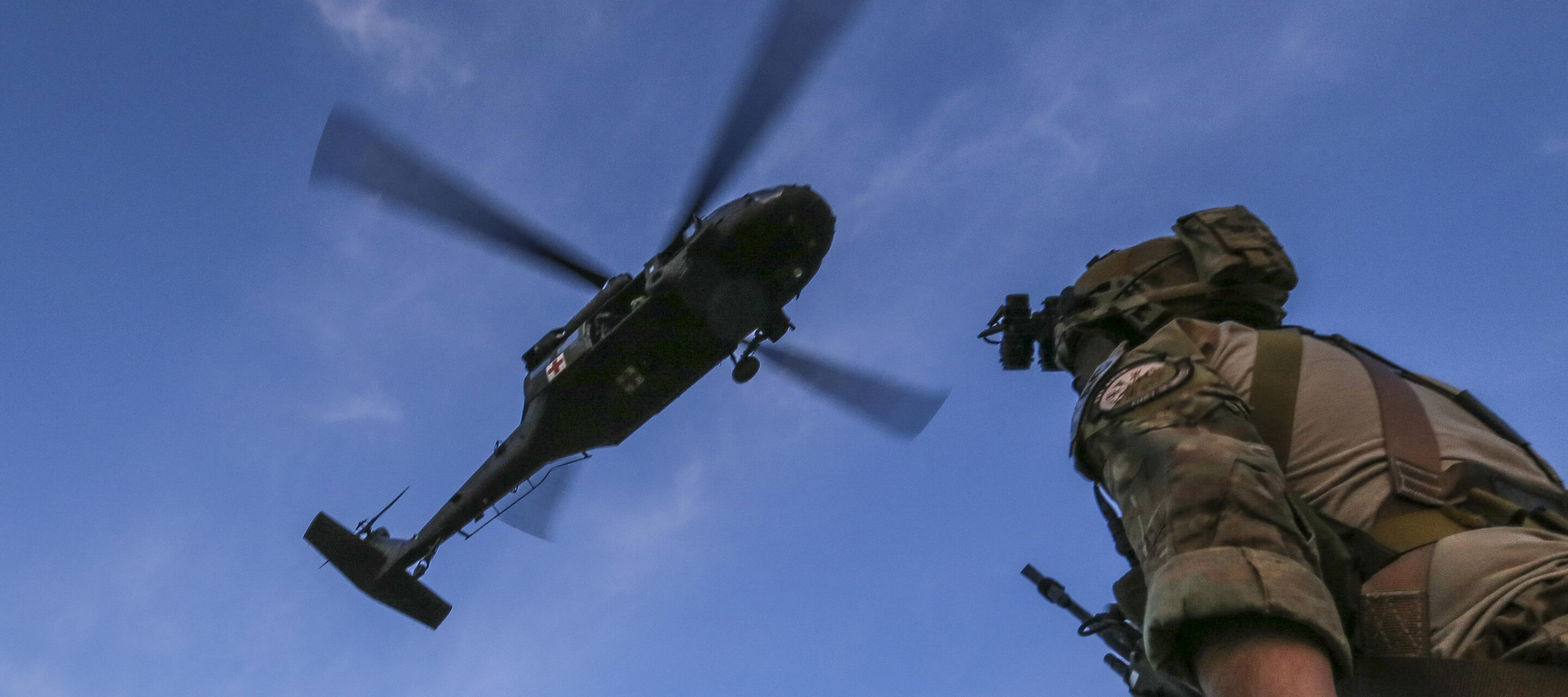 soldier looking up at sky