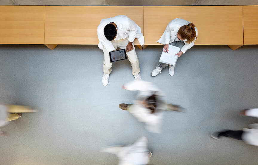 medical professionals rushing in hallways