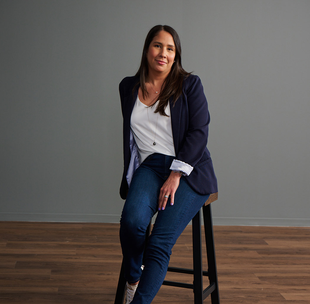 professional female on a stool