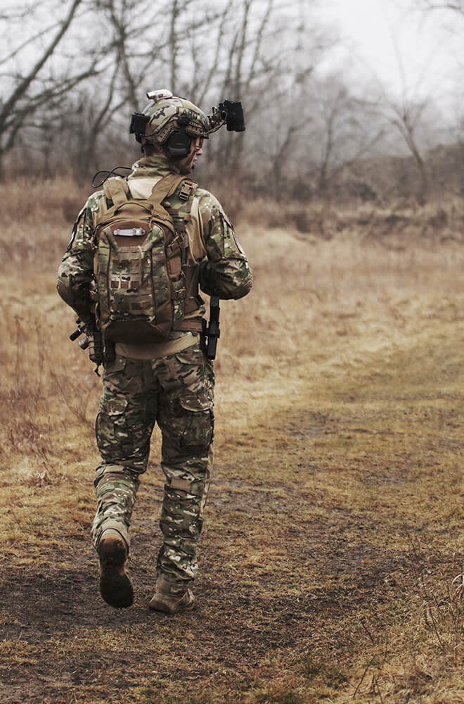 man in military uniform in field