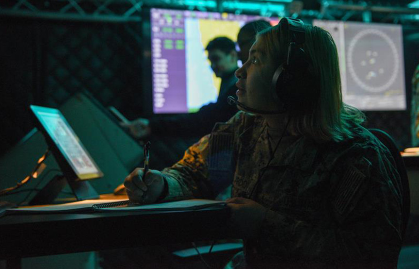 person looking at computer 