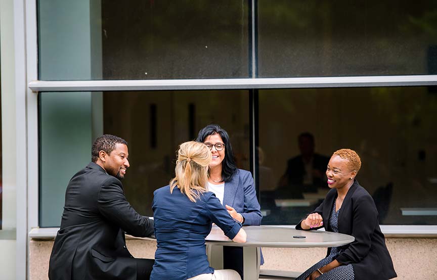 coworkers talking outside