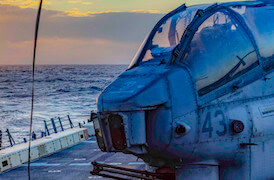 Helicopter on a ship on water