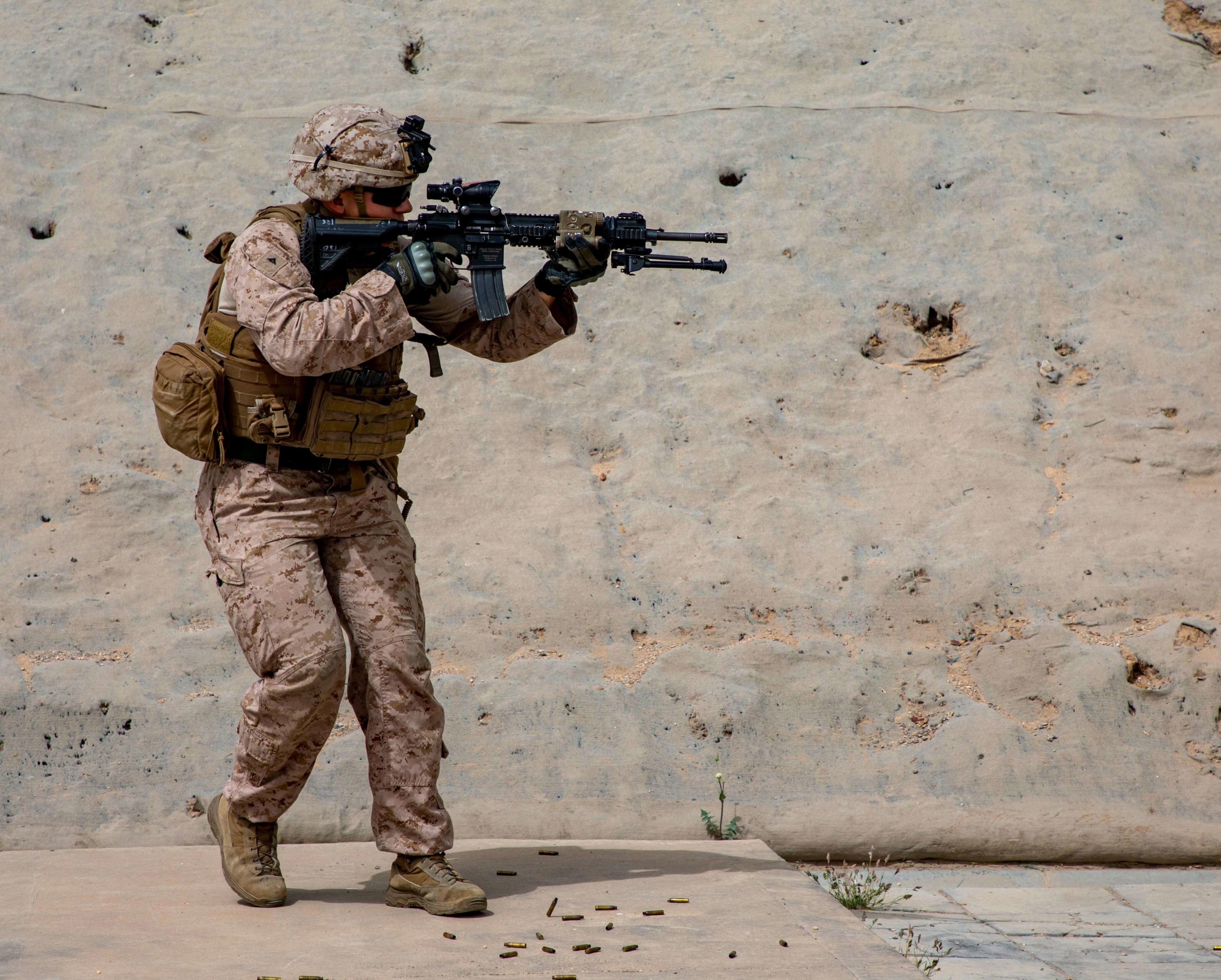 Solider aiming a rifle