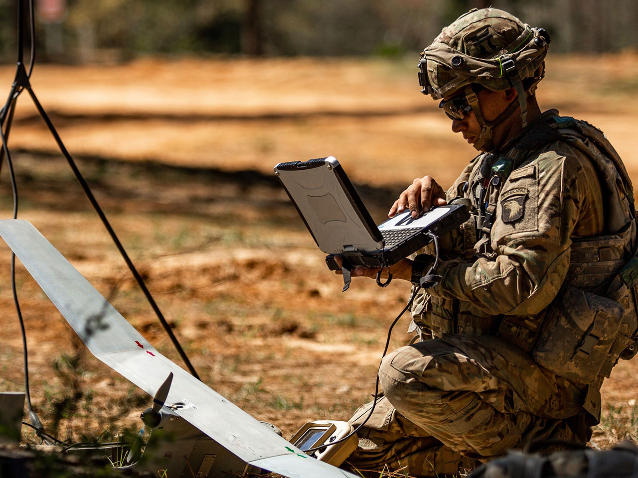 soldier looking at computer