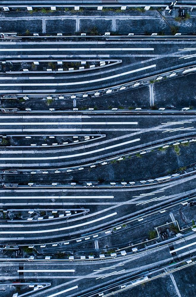 aerial view of roads with merging lanes