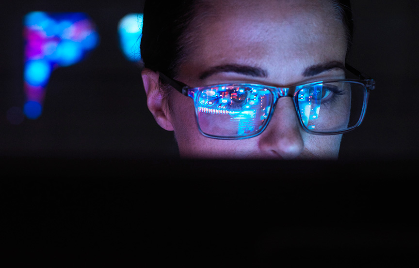 person looking at computer 