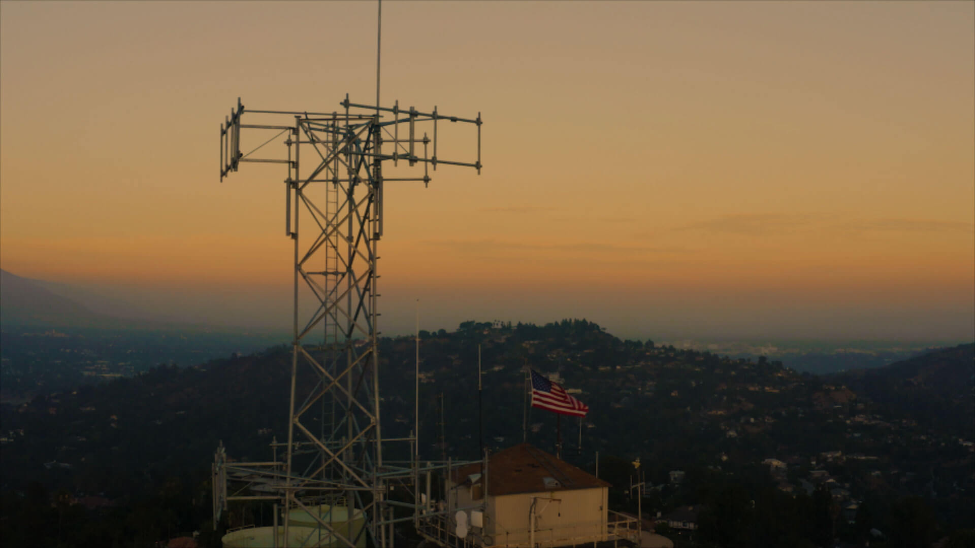 cell tower at sunset