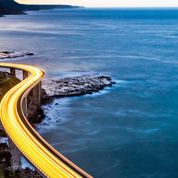 lit up road with water