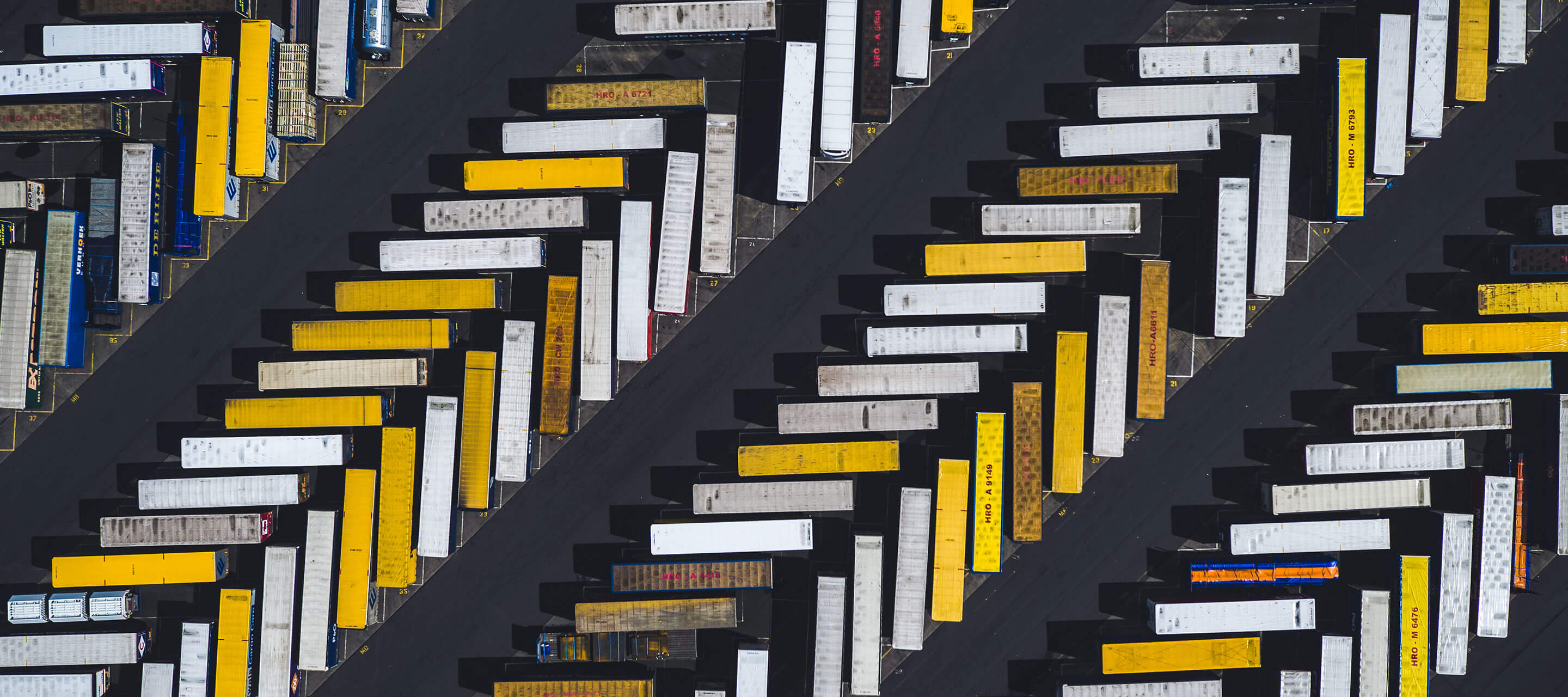 yellow and white shipping crates