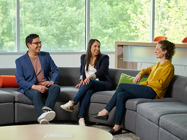 GDIT employees sitting together