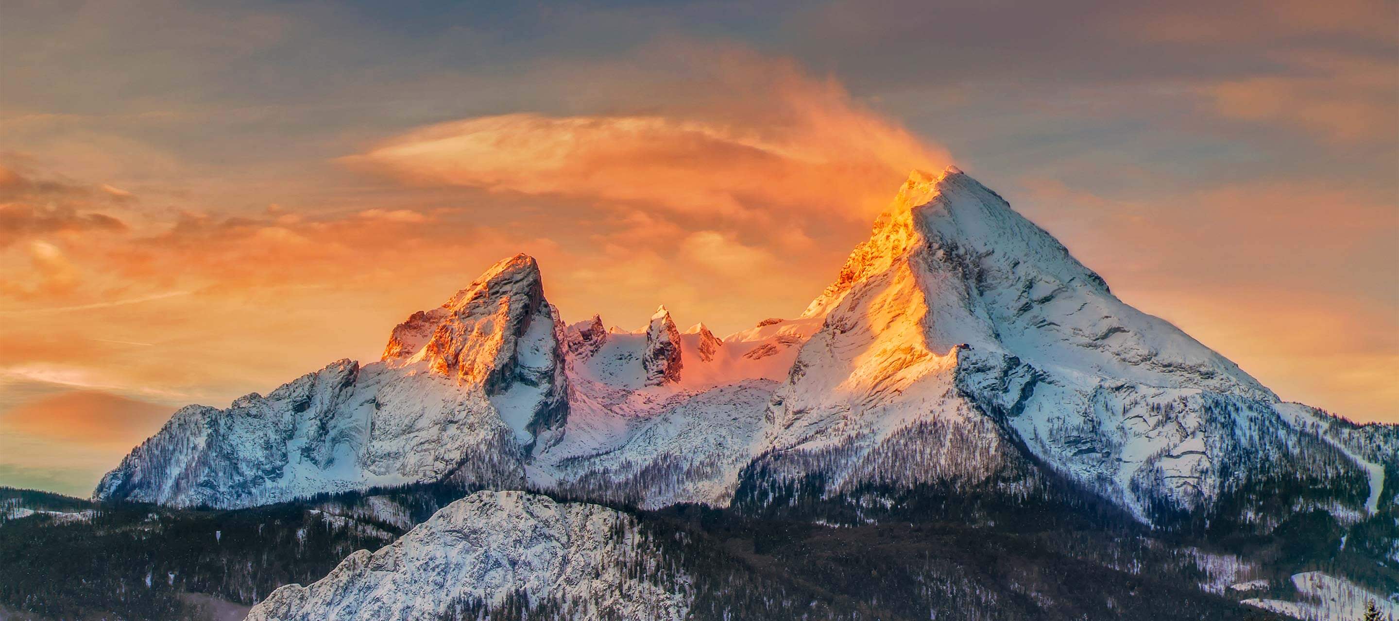 mountain with orange sunset