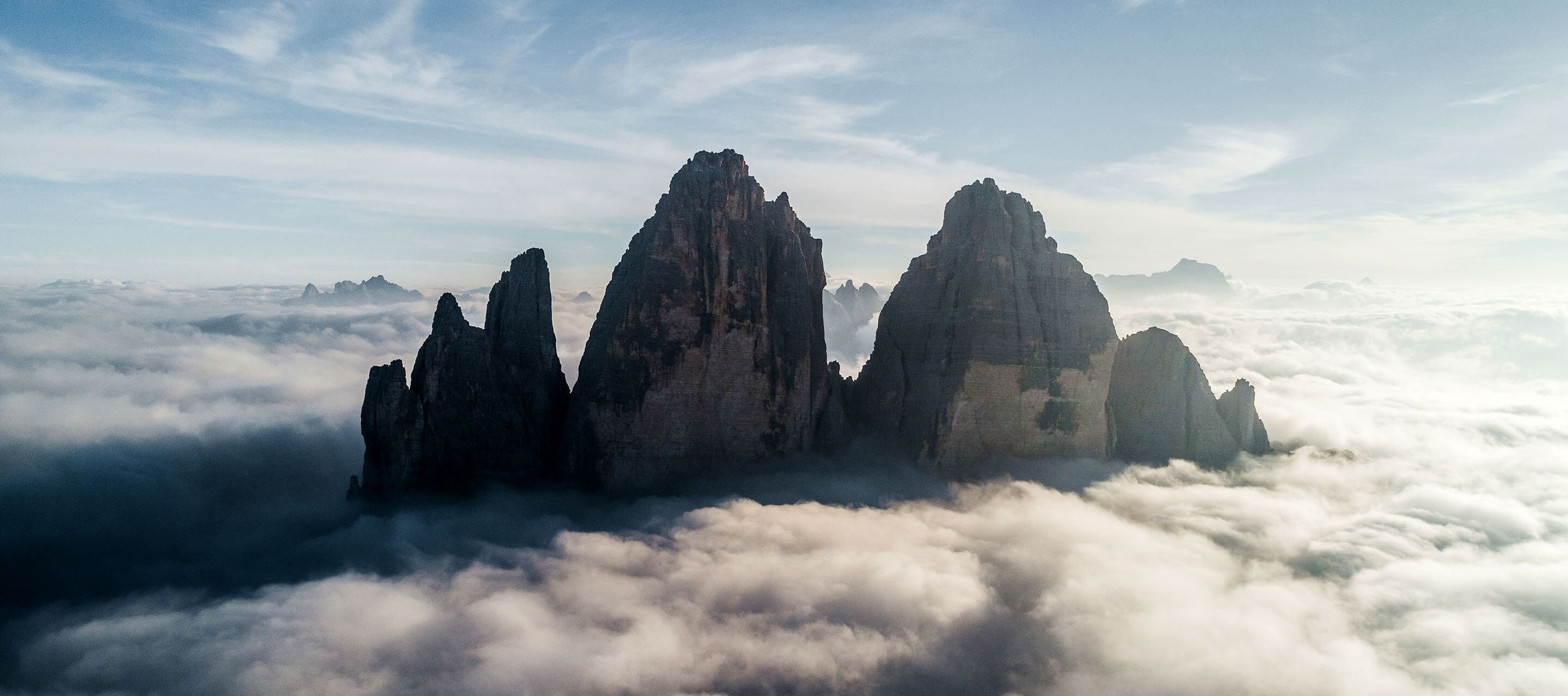 mountain top covered in clouds