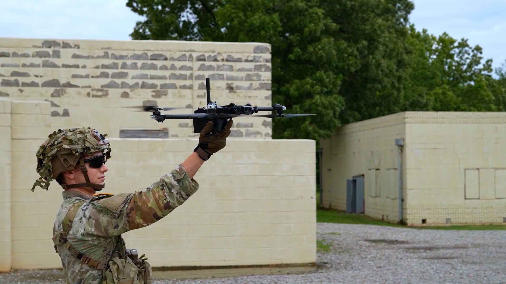 soldier holding drone