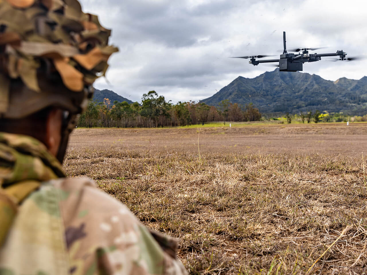 soldier looking onwards at a drone