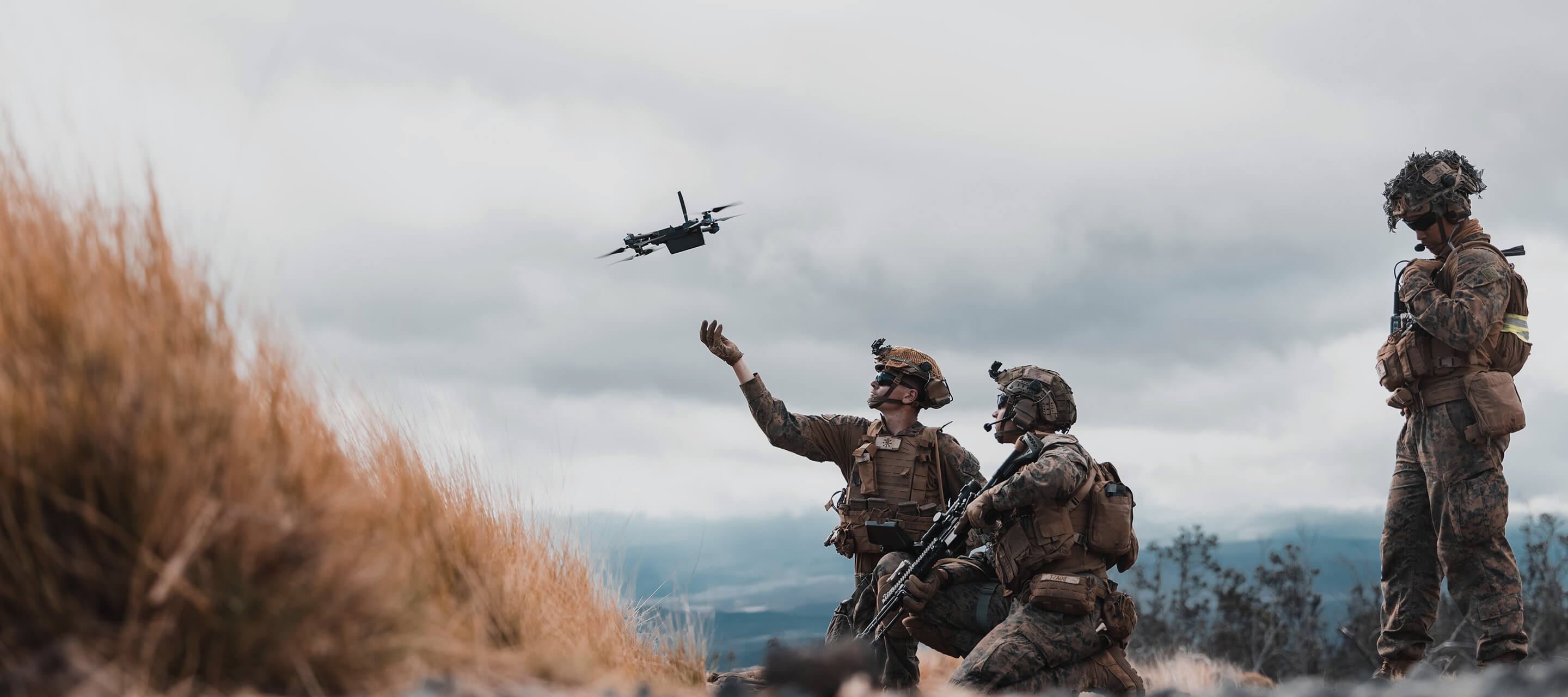 soldiers releasing a drone