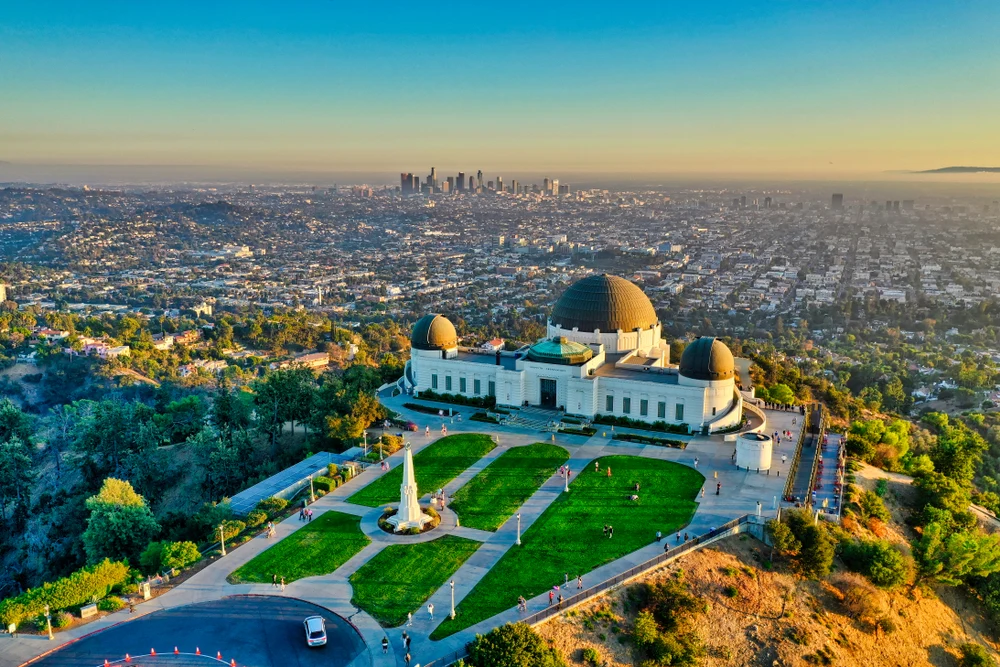 a view of Griffith Observatory, with Los Angeles in the background