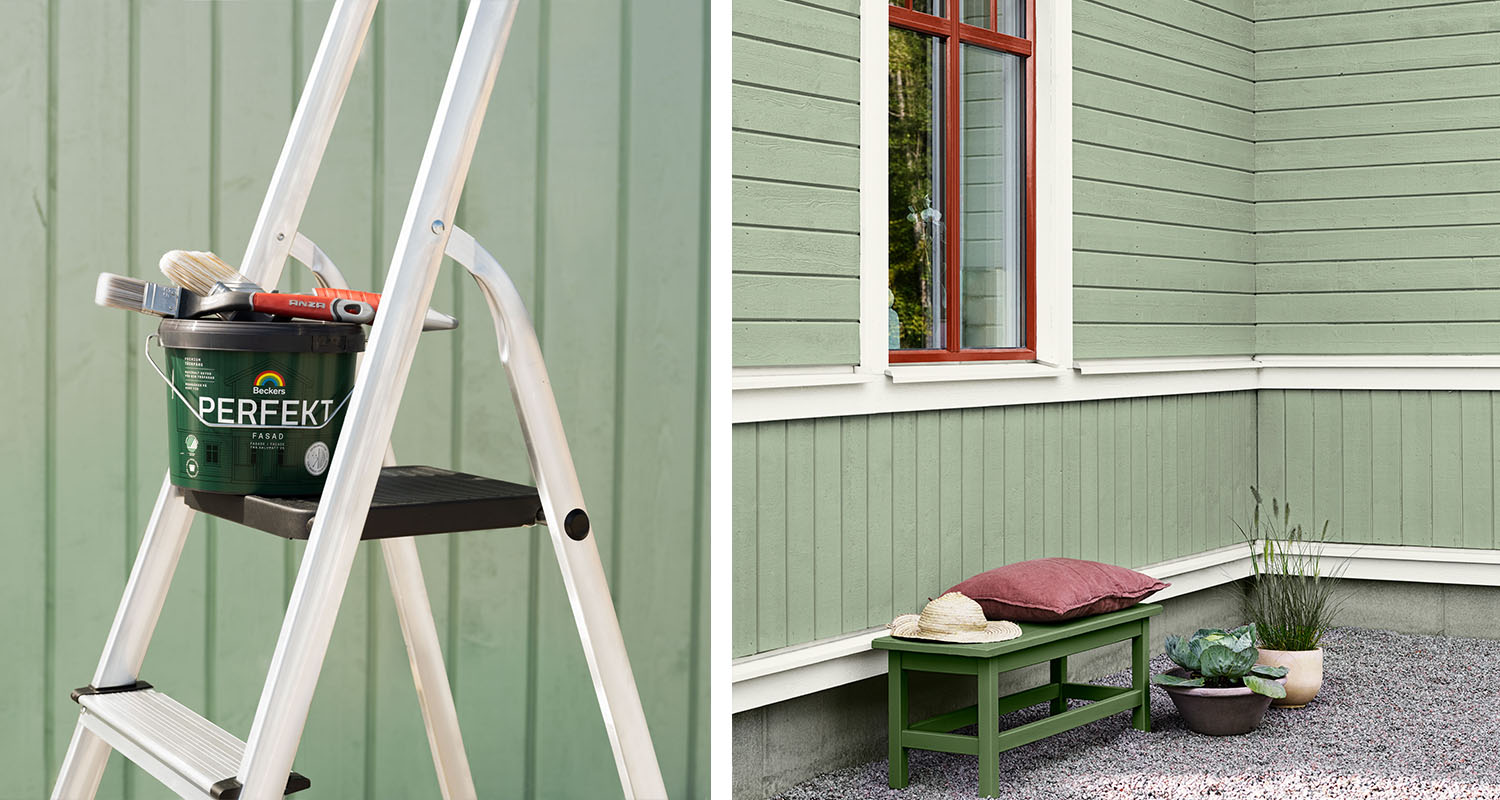 Stege med grön färghink och penslar framför mintgrön träfasad och grön bänk med kudde, hatt och växter.
