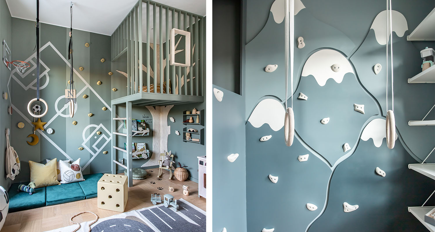 Barnrum i dämpad grön färg med klättergrepp, gymnastikringar, trädloft och leksaker.