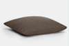 A plain, rectangular, brown pillow lies on a white surface, slightly angled with soft, smooth fabric and a plush appearance.