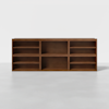 A large, rectangular wooden bookshelf with six open cubbies, arranged in two rows and three columns, set against a plain white background.
