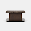 A modern rectangular coffee table with a dark marble top, wooden central support, and a flat wooden base, set against a plain white background.