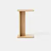 A small wooden side table with a minimalist design, featuring a vertical central support and two flat rectangular surfaces on the top and bottom, resembling the shape of the letter I.