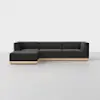 A modern, L-shaped sectional sofa with dark gray upholstery and a light wooden base, set against a plain white background on a light gray floor.