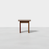 A simple wooden side table with a rectangular top and four straight legs, placed on a plain white surface against a white background.