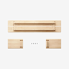 A disassembled wooden shelf with one long rectangular piece, two shorter end pieces with grooves, and five screws, all arranged neatly on a white background.