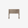 A wooden headboard with a simple, rectangular design and light brown finish, shown against a plain white background.