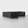 A modern, L-shaped sectional sofa with dark upholstery and a low, light wood base, set against a plain white background.