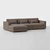 A modern, L-shaped sectional sofa with brown upholstery, low backrests, and rectangular cushions, set on a plain white background.