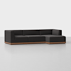A modern sectional sofa with dark charcoal upholstery and a low wooden base, featuring clean lines and a right-side chaise, set against a plain white background.