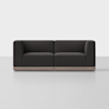 A modern, dark gray, two-seater sofa with boxy cushions and a light wooden base, set against a plain white background.