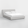 A modern, minimalist platform bed with a light gray upholstered frame, white bedding, and two pillows, set against a plain white background.