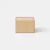 A minimalist, light wood nightstand with a single drawer partially open, placed on a plain, light-colored surface against a white background.