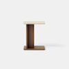 A modern side table with a rectangular wooden base, a vertical wooden support, and a light-colored rectangular top, displayed against a plain white background.