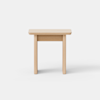 A small, light wood table with a simple rectangular top and four straight legs, set against a plain white background.
