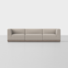 A modern, beige three-seater sofa with clean lines and a low wooden base is set against a plain white background.