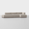 A modern, light beige sectional sofa with a low backrest and minimalist design, arranged in an L-shape on a smooth, light-colored floor against a plain white background.