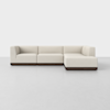 A modern, L-shaped sectional sofa with light beige upholstery and a dark wooden base, set against a plain white background.