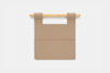 A beige felt organizer with two pockets hangs from a light wooden rod against a plain white background.
