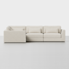 A modern, light beige sectional sofa with three seat cushions, three back cushions, and three matching bolster pillows, set against a plain white background.
