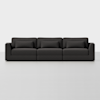 A modern, dark gray, three-seat sofa with clean lines and matching rectangular cushions, set against a plain white background.