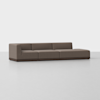 A modern, low-profile sectional sofa with brown upholstery and a dark wooden base, positioned on a light gray floor against a plain white background.