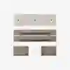 Top-down view of disassembled furniture parts, including a beige cushion, brown tabletop with bracket, two rectangular legs, and hardware, all neatly arranged on a white background.