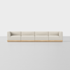 A modern, light beige four-seat sofa with low wooden base and clean, minimal design, set against a plain white background.