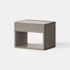 A modern wooden nightstand with a single drawer and an open lower shelf, featuring clean lines and a light grayish-brown finish, set against a plain white background.