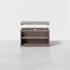 A rectangular wooden storage box with an open front shelf and a hinged lid raised above the box, displayed against a plain white background.